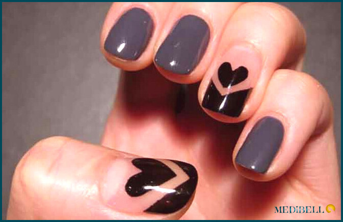 Diseño de uñas cortas con corazón negro