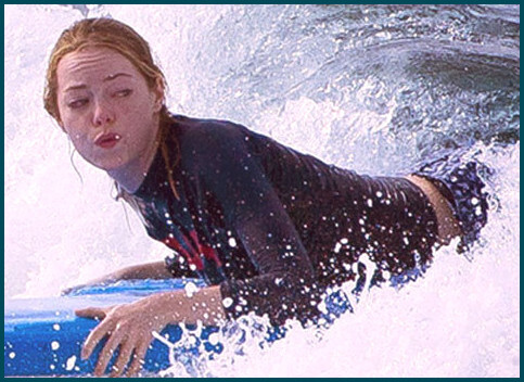 Emma Stone surfing her way