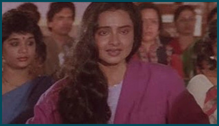 Rekha in her trademark hairstyle without makeup